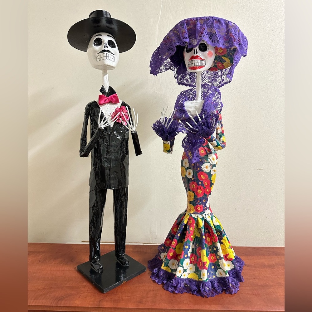 A pair of Paper Mache Skeletons